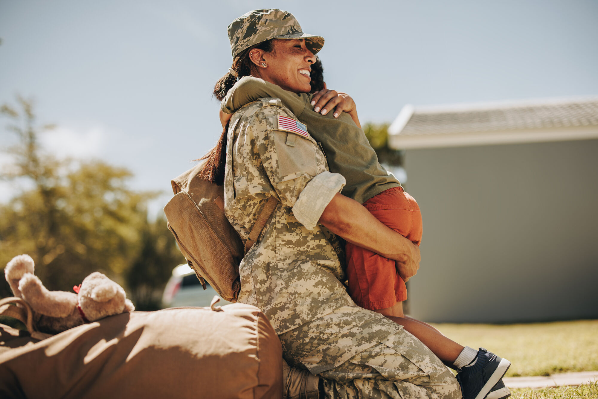 female solider and son